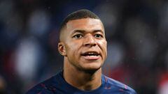 Paris Saint-Germain&#039;s French forward Kylian Mbappe looks on during warm-up before the French L1 football match between Paris-Saint Germain (PSG) and Olympique Lyonnais at The Parc des Princes Stadium in Paris on September 19, 2021. (Photo by Alain JO