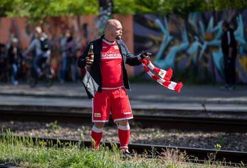 No entry | A fan of Union Berlin gestures outside the Stadion An der Alten Forsterei ahead of the Bundesliga match between FC Union Berlin and FC Bayern Munich on May 17, 2020 in Berlin, Germany.