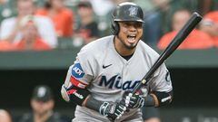 Jul 14, 2023; Baltimore, Maryland, USA; Miami Marlins second baseman Luis Arraez (3) reacts after taking a pouch during the first inning of the game against the Baltimore Orioles  at Oriole Park at Camden Yards. Mandatory Credit: Tommy Gilligan-USA TODAY Sports