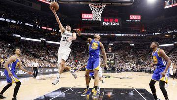 May 20, 2017; San Antonio, TX, USA; San Antonio Spurs shooting guard Manu Ginobili (20) drives to the basket past Golden State Warriors power forward David West (3) during the first half in game three of the Western conference finals of the NBA Playoffs a