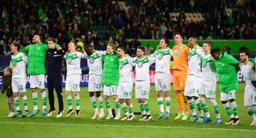 Wolfsburg's players react after 2-0 victory during the UEFA Champions League quarter-final, first-leg football match between VfL Wolfsburg and Real Madrid on April 6, 2016 in Wolfsburg, northern Germany.