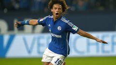 Schalke&#039;s midfielder Leroy Sane celebrates scoring during the German first division Bundesliga football match FC Schalke 04 v Eintracht Frankfurt in Gelsenkirchen, on September 23, 2015.    AFP PHOTO / PATRIK STOLLARZ  RESTRICTIONS: DURING MATCH TIME: DFL RULES TO LIMIT THE ONLINE USAGE TO 15 PICTURES PER MATCH AND FORBID IMAGE SEQUENCES TO SIMULATE VIDEO.  ==RESTRICTED TO EDITORIAL USE == FOR FURTHER QUERIES PLEASE  CONTACT THE  DFL DIRECTLY AT + 49 69 650050.