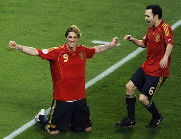 Another moment | Spain's Fernando Torres celebrates with Andres Iniesta after scoring during their Euro 2008 final against Germany.
