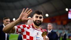DOHA, QATAR - DECEMBER 17: Josko Gvardiol of Croatia celebrates with the FIFA World Cup Qatar 2022 third placed medal after the team's victory  during the FIFA World Cup Qatar 2022 3rd Place match between Croatia and Morocco at Khalifa International Stadium on December 17, 2022 in Doha, Qatar. (Photo by Markus Gilliar - GES Sportfoto/Getty Images)