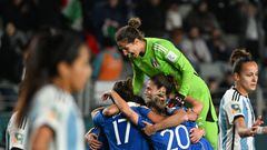 Italy players celebrate their victory after the final whistle of the Australia and New Zealand 2023 Women's World Cup Group G football match between Italy and Argentina at Eden Park in Auckland on July 24, 2023. (Photo by Saeed KHAN / AFP)