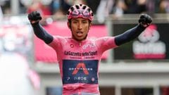 (FILES) In this file photo taken on May 24, 2021, wverall leader Team Ineos rider Colombia&#039;s Egan Bernal celebrates as he crosses the finish line to win the 16th stage of the Giro d&#039;Italia 2021 cycling race, 153km between Sacile and Cortina d&#0