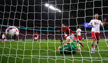 Zlatan scores United's third goal past goalkeeper Fraser Forster of Southampton during the EFL Cup Final.