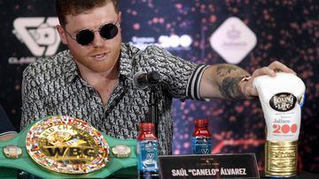 Mexican boxer Canelo Alvarez gestures during a press conference to present his fight against English boxer John Ryder on May 6, in Zapopan, Jalisco state, Mexico, on March 14, 2023. (Photo by Ulises Ruiz / AFP)