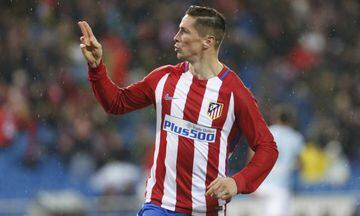 Torres celebrates his astonishing goal.