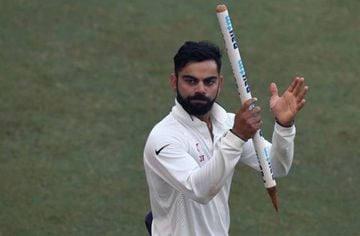 India's captain Virat Kohli applauds the crowd as he leads his team on a victory lap of the ground after India won the fourth Test.