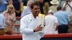 Tennis - Rogers Cup Montreal  11 August 2019, Canada, Montreal: Spanish tennis player Rafael Nadal celebrates with the trophy after defeating Russia&#039;s Daniil Medvedev (not pictured) during their men&#039;s final tennis match of the Rogers Cup Montr