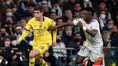 Chelsea's Christian Pulisic (left) evades Real Madrid's Vinicius Junior during the UEFA Champions League quarter final, second leg match at Santiago Bernabeu Stadium, Madrid. Picture date: Tuesday April 12, 2022. (Photo by Nick Potts/PA Images via Getty Images)