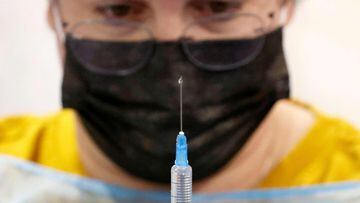 A healthcare worker prepares a dose of the Pfizer-BioNtech Covid-19 vaccine. 