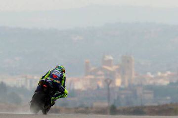 Valentino Rossi backdropped by the Santa Maria la Mayor church in the nearby town of Alcaniz, during practice for the Aragón MotoGP.