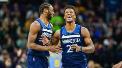 Jan 1, 2018; Minneapolis, MN, USA; Minnesota Timberwolves guard Jimmy Butler (R) and forward Andrew Wiggins (L) react during the first quarter against the Los Angeles Lakers at Target Center. Mandatory Credit: Jeffrey Becker-USA TODAY Sports