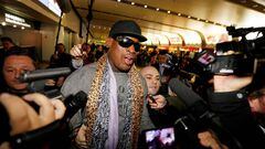Former NBA basketball player Dennis Rodman speaks to the media after returning from his trip to North Korea at Beijing airport, December 23, 2013. 