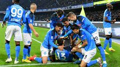 Napoli's Kosovan defender Amir Rrahmani celebrates with team mates after scoring a goal during the Italian Serie A football match between Napoli and Juventus at the Diego-Maradona stadium in Naples on January 13, 2023. (Photo by Alberto PIZZOLI / AFP)