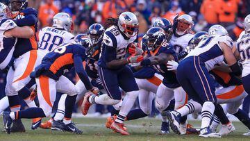 DENVER, CO - DECEMBER 18: Running back LeGarrette Blount #29 of the New England Patriots rushes against the Denver Broncos in the second quarter at Sports Authority Field at Mile High on December 18, 2016 in Denver, Colorado.   Sean M. Haffey/Getty Images/AFP == FOR NEWSPAPERS, INTERNET, TELCOS &amp; TELEVISION USE ONLY ==