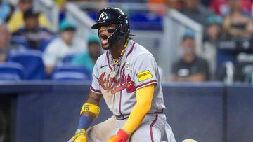 MIAMI, FLORIDA - SEPTEMBER 15: Ronald Acuna Jr. #13 of the Atlanta Braves celebrates after scoring against the Miami Marlins during the third inning at loanDepot park on September 15, 2023 in Miami, Florida.   Rich Storry/Getty Images/AFP (Photo by Rich Storry / GETTY IMAGES NORTH AMERICA / Getty Images via AFP)