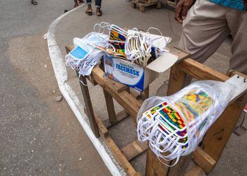 A display of face masks for sale after the partial lockdown in parts of Ghana to halt the spread of the COVID-19 coronavirus was lifted in Accra, Ghana on April 20, 2020. - The streets of Accra buzzed with life following President Nana Akufo-Addo's announ