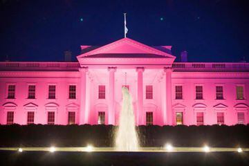 The White House is illuminated in pink for Breast Cancer Awareness month in Washington, DC on October 1, 2021.