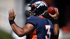 Russell Wilson of the Denver Broncos throws during training camp at UCHealth Training Center on Tuesday, August 2, 2022.