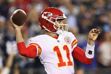 Alex Smith of the Kansas City Chiefs looks to pass during the first half against the New England Patriots