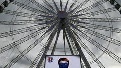 Pictures of soccer fans are displayed on the ferris wheel as part of the upcoming Euro 2016 tournament, in Paris, 