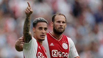 AMSTERDAM, NETHERLANDS - AUGUST 14: Antony of Ajax celebrates 2-1 with Daley Blnd of Ajax  during the Dutch Eredivisie  match between Ajax v FC Groningen at the Johan Cruijff Arena on August 14, 2022 in Amsterdam Netherlands (Photo by Rico Brouwer/Soccrates/Getty Images)
