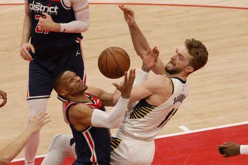 May 3, 2021; Washington, District of Columbia, USA; Washington Wizards guard Russell Westbrook (4) grabs a rebound in front of Indiana Pacers forward Domantas Sabonis (11) in the first quarter at Capital One Arena. Mandatory Credit: Geoff Burke-USA TODAY 