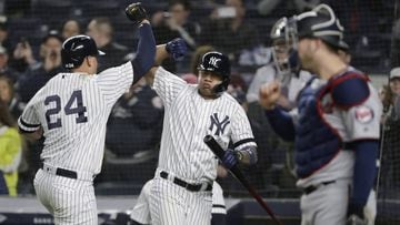 New York Yankees&#039; Gary Sanchez, left, celebrates with teammate Gleyber Torres, center, as Minnesota Twins catcher Mitch Garver looks away during the seventh inning of a baseball game Friday, May 3, 2019, in New York. (AP Photo/Frank Franklin II)