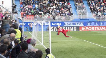 Courtois tips an early Kike García volley onto the post