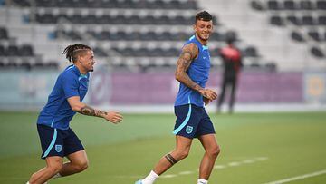 England's midfielder Kalvin Phillips (L) and England's defender Ben White take part in a  training session at the Al Wakrah SC Stadium in Al Wakrah, south of Doha, on November 20, 2022, on the eve of the Qatar 2022 World Cup football tournament Group B match between England and Iran. (Photo by Paul ELLIS / AFP)