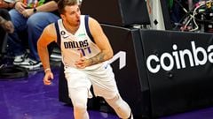 Luka Doncic put up 35 points in the Mavericks season opener against the Phoenix Suns, but they blew a 22-point lead and lost 107-105.