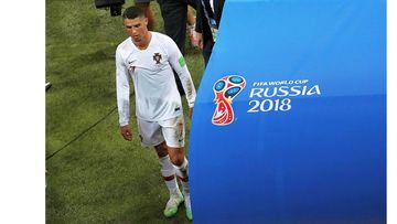 Soccer Football - World Cup - Round of 16 - Uruguay vs Portugal - Fisht Stadium, Sochi, Russia - June 30, 2018   Portugal&#039;s Cristiano Ronaldo looks dejected as he walks off the pitch after the match    REUTERS/Sergio Perez