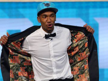 Jun 22, 2017; Brooklyn, NY, USA; Malik Monk (Kentucky) shows off the inside of his suit jacket as he is introduced as the number eleven overall pick to the Charlotte Hornets in the first round of the 2017 NBA Draft at Barclays Center. Mandatory Credit: Brad Penner-USA TODAY Sports