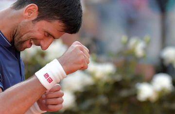 Djokovic celebrates after winning beating Bautista Agut in Rome on Thursday.