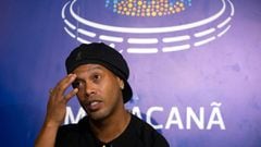 Brazil&#039;s football player Ronaldinho Gaucho gestures during a ceremony to stamp his footprints at Maracana Stadium&#039;s Hall of Fame, in Rio de Janeiro, Brazil, on January 08, 2018. - Ronaldinho Gaucho was awarded Best FIFA Men&#039;s Player twice -