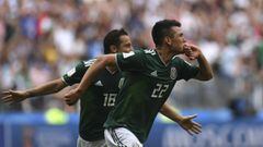 Mexico&#039;s forward Hirving Lozano (front C) celebrates after scoring a goal next to teammate midfielder Andres Guardado during the Russia 2018 World Cup Group F football match between Germany and Mexico at the Luzhniki Stadium in Moscow on June 17, 201
