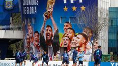 Soccer Football - World Cup - South American Qualifiers - Argentina Training - Stadium, Buenos Aires, Argentina - September 10, 2023 General view of a mural with Argentina lifting the World Cup trophy during training REUTERS/Agustin Marcarian
