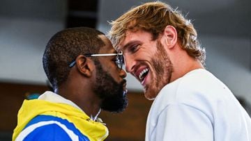 Former world welterweight king Floyd Mayweather (L) and YouTube personality Logan Paul face-off during the media availability ahead of their June 6 exhibition boxing match, on June 3, 2021 at Villa Casa Casuarina at the former Versace Mansion in Miami Bea