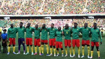 Cameroon&#039;s players ing the national anthem before the Africa Cup of Nations (CAN) 2021 quarter final football match between Gambia and Cameroon at the Japoma Stadium in Douala on January 29, 2022. (Photo by CHARLY TRIBALLEAU / AFP)