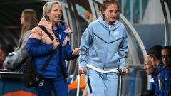 England's midfielder #04 Keira Walsh (R) walks with crutches after an injury during the Australia and New Zealand 2023 Women's World Cup Group D football match between England and Denmark at Sydney Football Stadium in Sydney on July 28, 2023. (Photo by FRANCK FIFE / AFP)