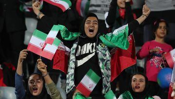 Women get extra stand for Iran World Cup qualifier  FILED - 16 October 2018, Iran, Tehran: Iranian women cheer for their team in the stands during an International Friendly soccer match between Iran and Bolivia at the Azadi Stadium. Around 4,600 seats i