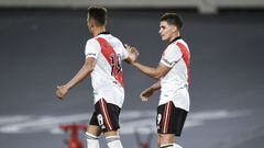BUENOS AIRES, ARGENTINA - SEPTEMBER 19: Braian Romero and Julian Alvarez of River Plate celebrate their first goal scored by an own goal of Emiliano Mendez of Arsenal (not in Frame) during a match between River Plate and Arsenal as part of Torneo Liga Pro