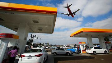 With holiday travel approaching, gas prices continue trending downward