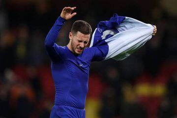 Eden Hazard of Chelsea throws his shirt to the fans following his side's victory in the Premier League match against Watford.