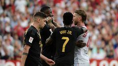 Sevilla's Spanish defender #04 Sergio Ramos (R) and Real Madrid's German defender #22 Antonio Rudiger (2nd-L) argue during the Spanish league football match between Sevilla FC and Real Madrid CF at the Ramon Sanchez Pizjuan stadium in Seville on October 21, 2023. (Photo by CRISTINA QUICLER / AFP)