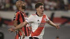 River Plate's forward Julian Alvarez (R) celebrates after scoring his team's third goal against Patronato during the Argentine Professional Football League match at the Monumental stadium in Buenos Aires, Argentina, on February 16, 2022. (Photo by JUAN MABROMATA / AFP)