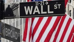 The Wall Street sign is pictured at the New York Stock exchange (NYSE) in the Manhattan borough of New York City.